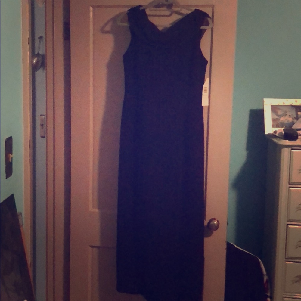Black gown with V back with diamond accent